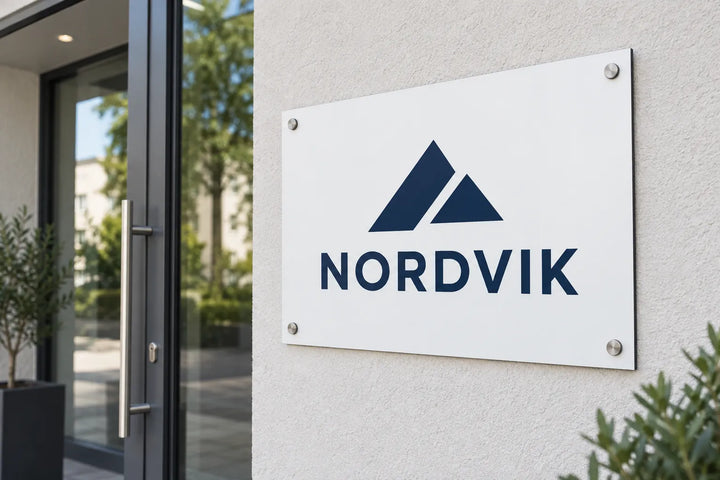 Custom aluminium composite company sign with logo on an office façade