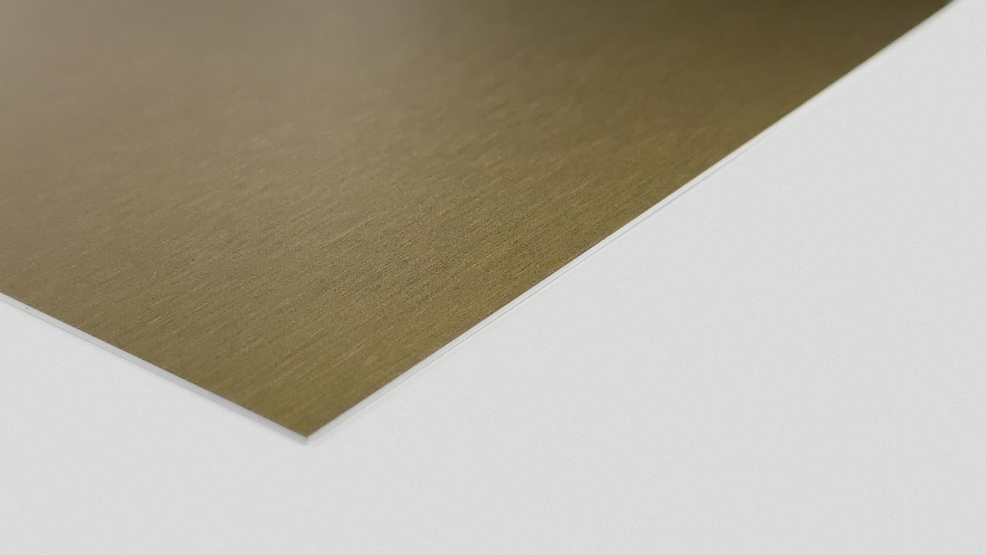 Brass-effect aluminium sign plate with a warm gold brushed finish
